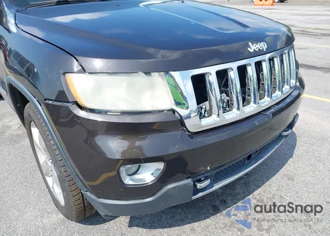 2012 Jeep Grand Cherokee Overland из США, поврежденный, VIN 1C4RJFCG4CC324331